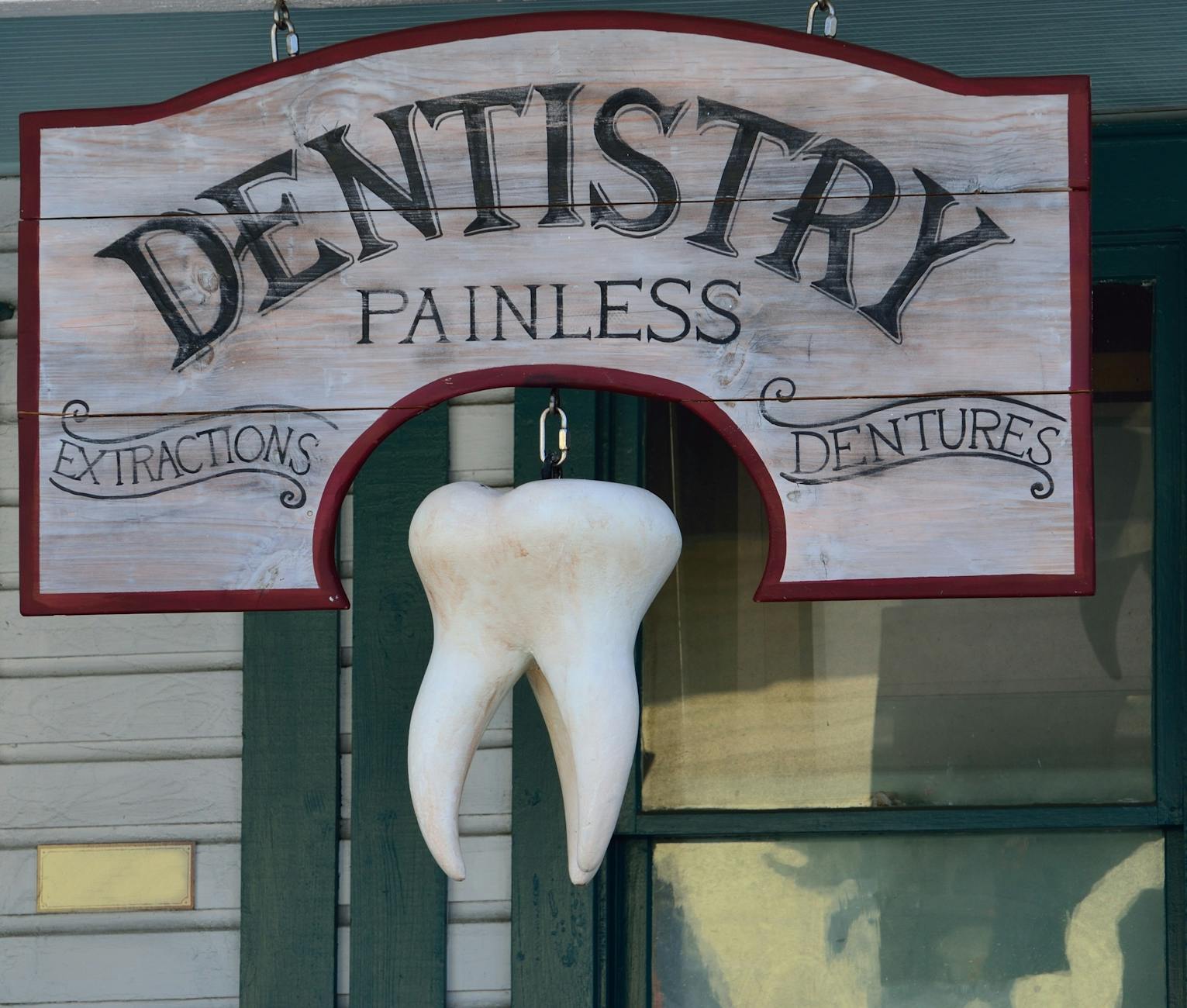 dentistry painless signage